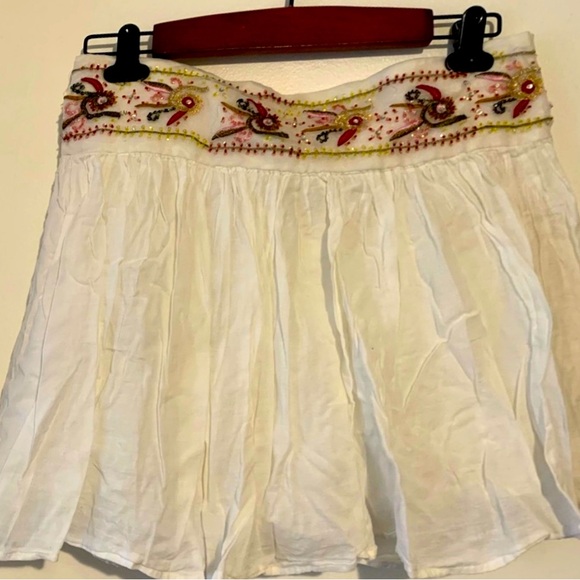 FANG. White Muslim mini skirt. Beautifully embroidered front Waistband. - Picture 1 of 3
